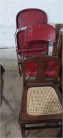 2 metal folding chairs and wicker seat chair