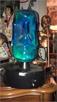 Blue green lighted glass head