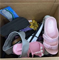 Box of new and used flip flops and sandals