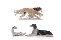 THREE GERMAN PORCELAIN FIGURES OF BORZOIS DOGS