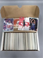 Box of football and basketball cards