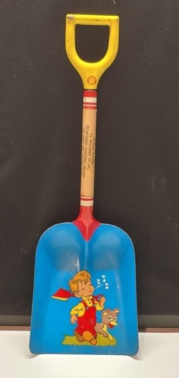 Vintage child's metal shovel used at church