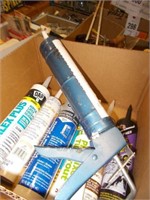 Box of Caulk, Roof Cement, Liquid Nails,