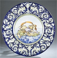 Large majolica charger. Continental. 19th century.