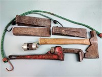 Pipe wrench, hatchet, wedges