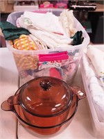 Container of vintage linens including lap robe,