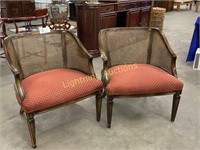 TWO VINTAGE CANEBACK ARM CHAIRS WITH RED SEAT