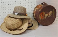 Older wicker hat carrier basket and three hats