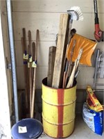 Snow, shovels, and barrel of miscellaneous