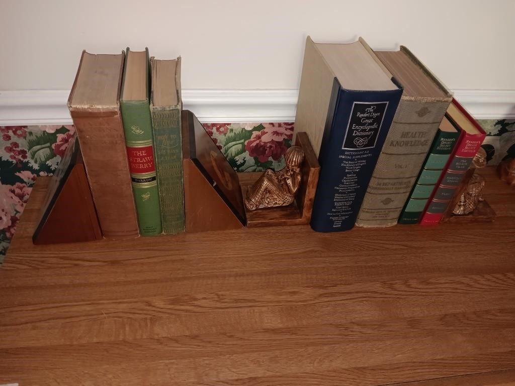2 pair of bookends and 7 vintage books.