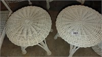 pair of white whicker side tables