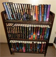 Wood book shelf w/Stuart Woods books