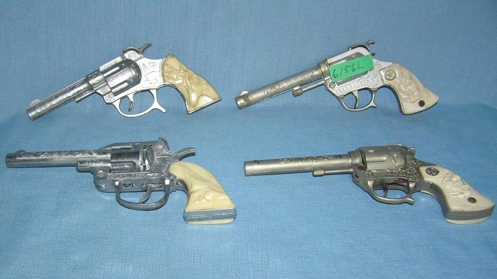 Group of vintage western themed cap guns