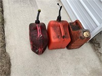3 PLASTIC GAS CANS 1 IS OVER 1/2 FULL OF FRESH GAS