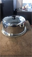 Metal round cake pan on dish