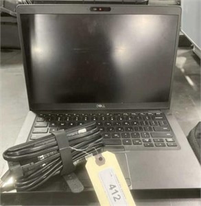 -Dell laptop with charging cords