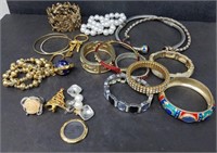 Group of costume jewelry pins, bracelet,