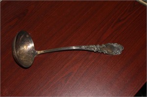 An Ornate Silverplated Laddle