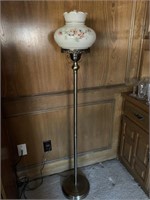 Vintage brass with glass globe floor lamp.