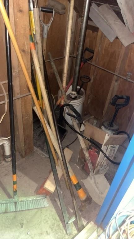 Lot of brooms, shovels, misc tools