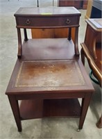 STEP BACK LEATHER TOP END TABLE ON CASTERS