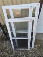 Used storm windows, 39" and 47" x 21"