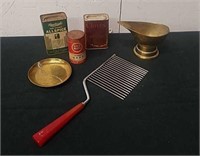 Group of vintage spice tins, some brass, and a