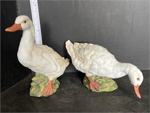 2 glass duck figures