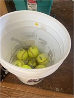 5 gallon bucket with 15 softballs