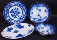 Four pieces of flow blue china: 15" oval