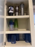 Cabinet with Plastic Tumblers and Travel Cups