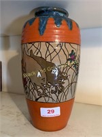 10 inch pottery vase with wild boars