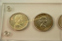 SIX CANADIAN COMMEMORATIVE SILVER DOLLARS IN CASE