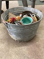 Galvanized bushel basket with contents
