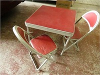 Child's folding table & chairs.