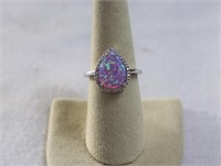 Pear cut pink oval ring