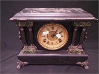 A black striking mantel clock, 8-day,