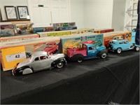3 Vintage assembled model cars with original boxes