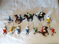 12 Toy metal Antique Britain soldiers made in
