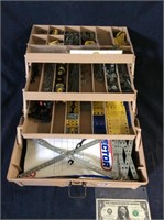 tackle box full of erector set pieces