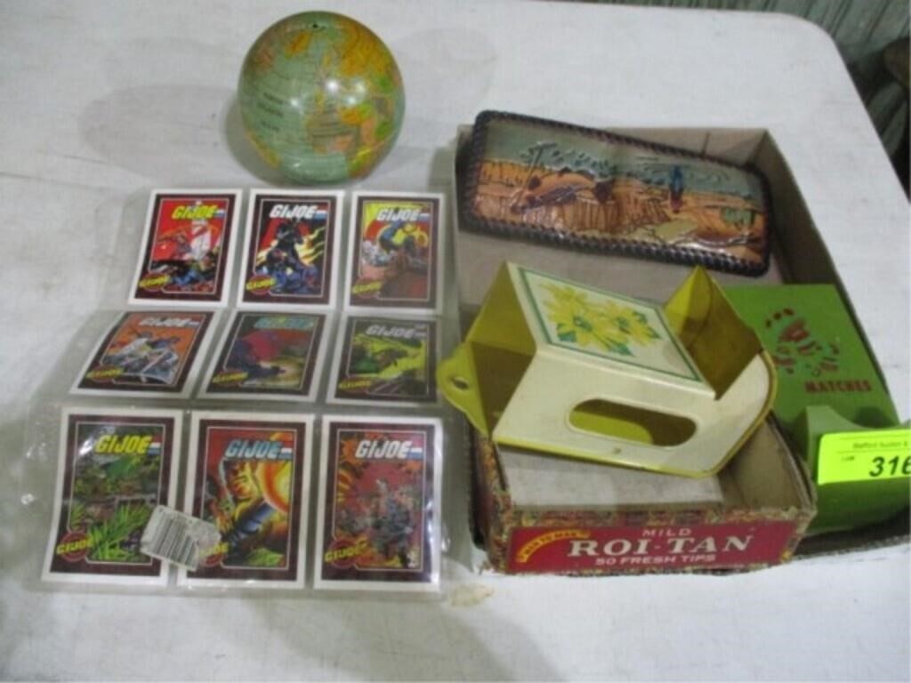 GI Joe cards, fish billfold, globe and match box