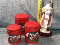 (D) 10 inch tall Santa and set of nesting cans.