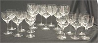 Three sets of white / red wine glasses