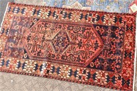 TWO ZANJAN NAVY AND RASPBERRY CARPETS