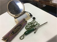 Vintage electric curling iron and lighted mirror