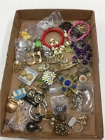 Flat of costume jewelry