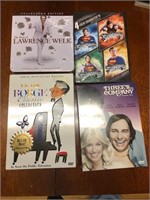 Lot of 4 sealed DVD’s and CDS
