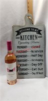 Kitchen sign and bottle