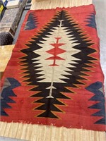 Very early antique Navajo rug in very good