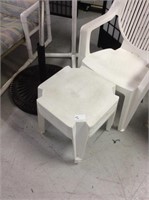 Three outdoor plastic tables